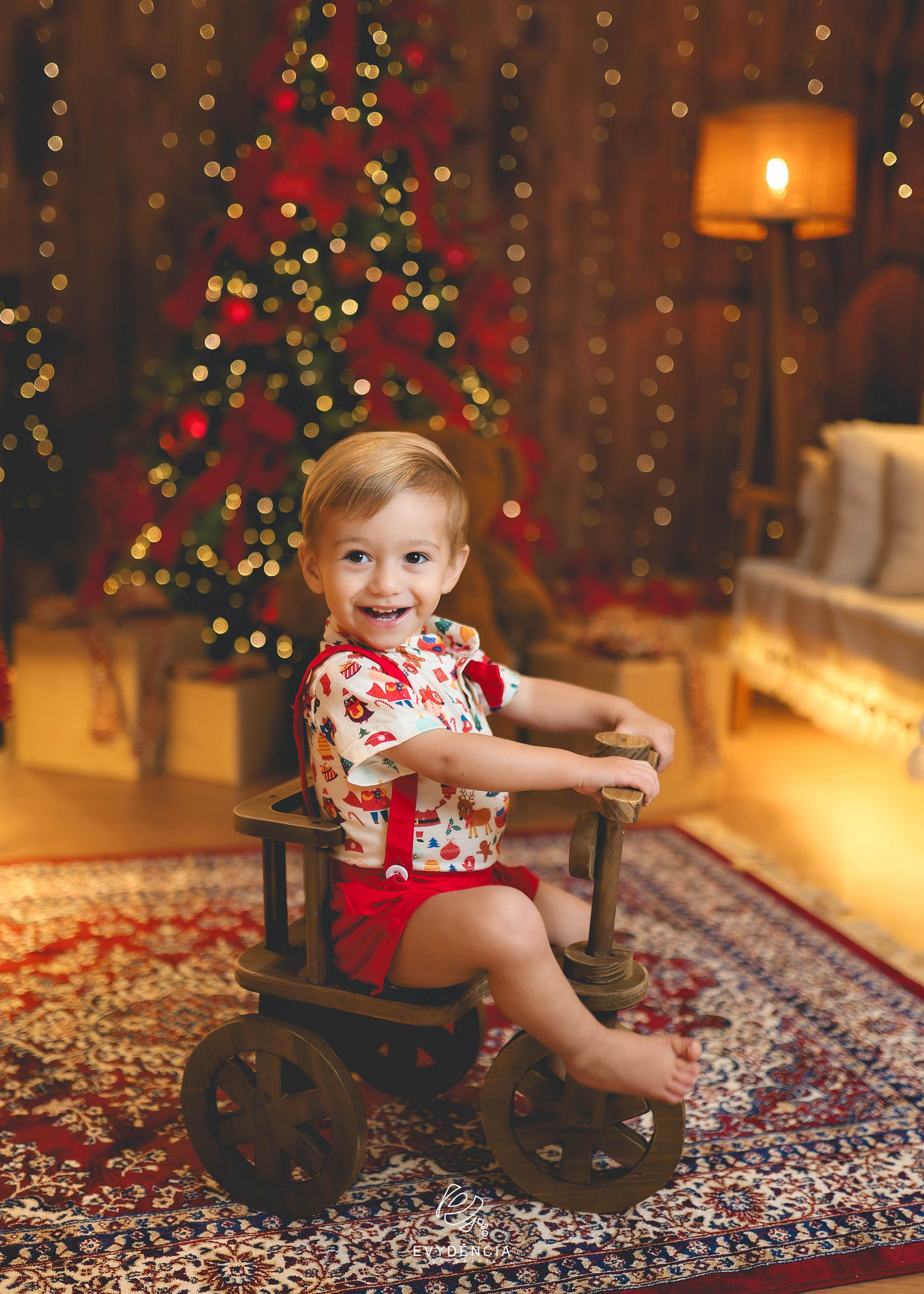 Fotos de Natal em familia no cenario do Estúdio Evydência
